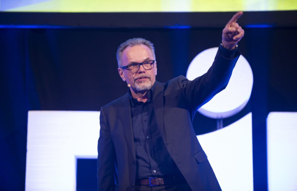 image of Jarmo Eskelinen speaking at EIE 2019