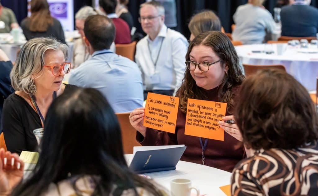 photo of participants at the Data and AI Exchange event