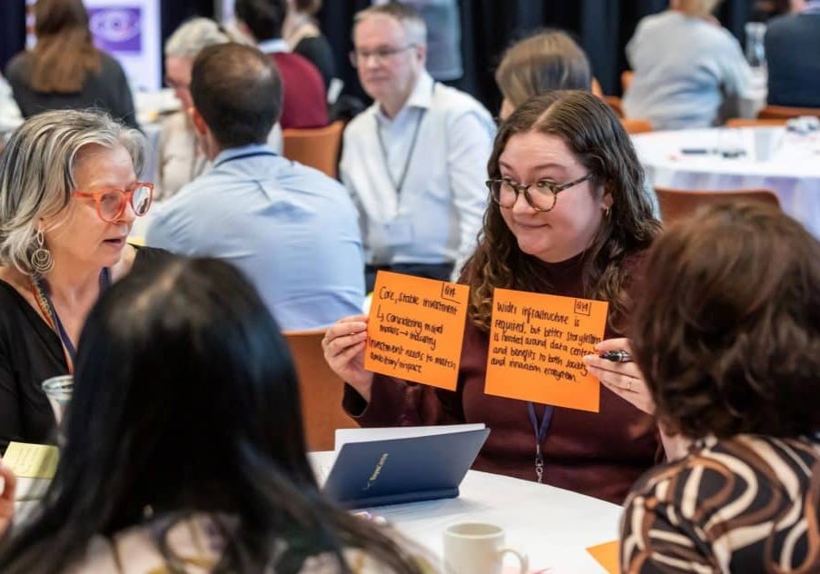 photo of participants at the Data and AI Exchange event
